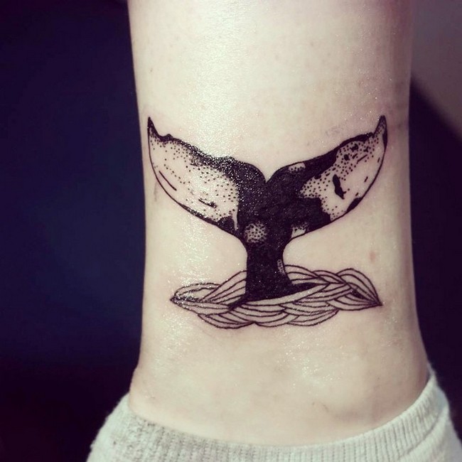 grey-and-black-whale-tail-tattoo